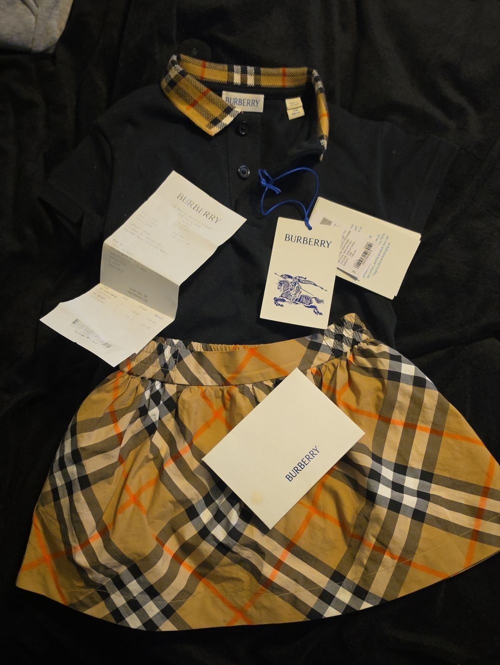 Burberry Black Polo with Beige & Orange Check Skirt